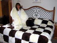 Bedspread made of original Peruvian baby alpaca skins with cushion and boa