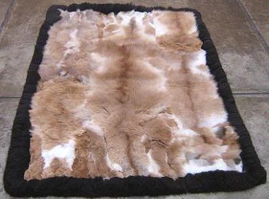 Peruvian baby alpaca fur rug with black border