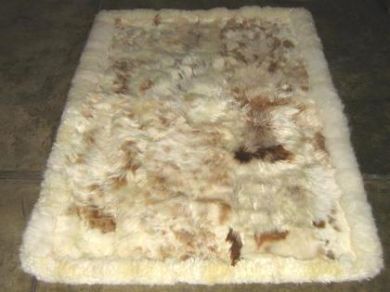 Peruvian baby alpaca fur rug with brown spots