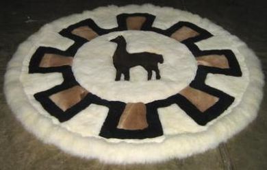 Round white alpaca fur carpet with designs
